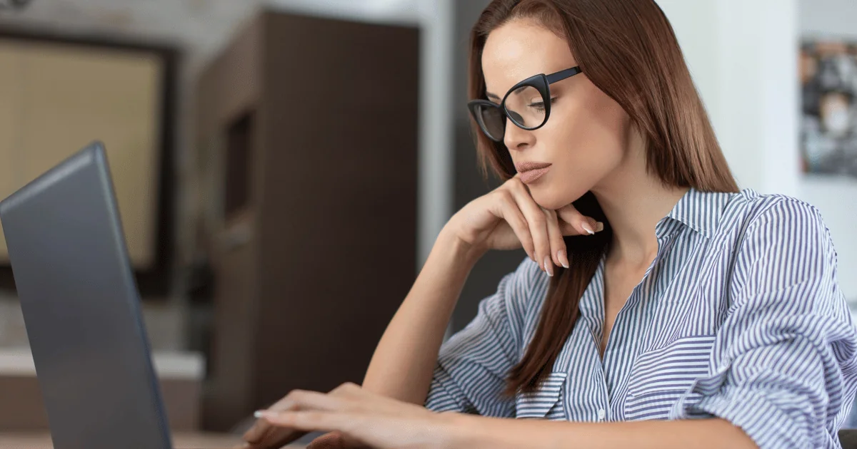 Woman working at a laptop