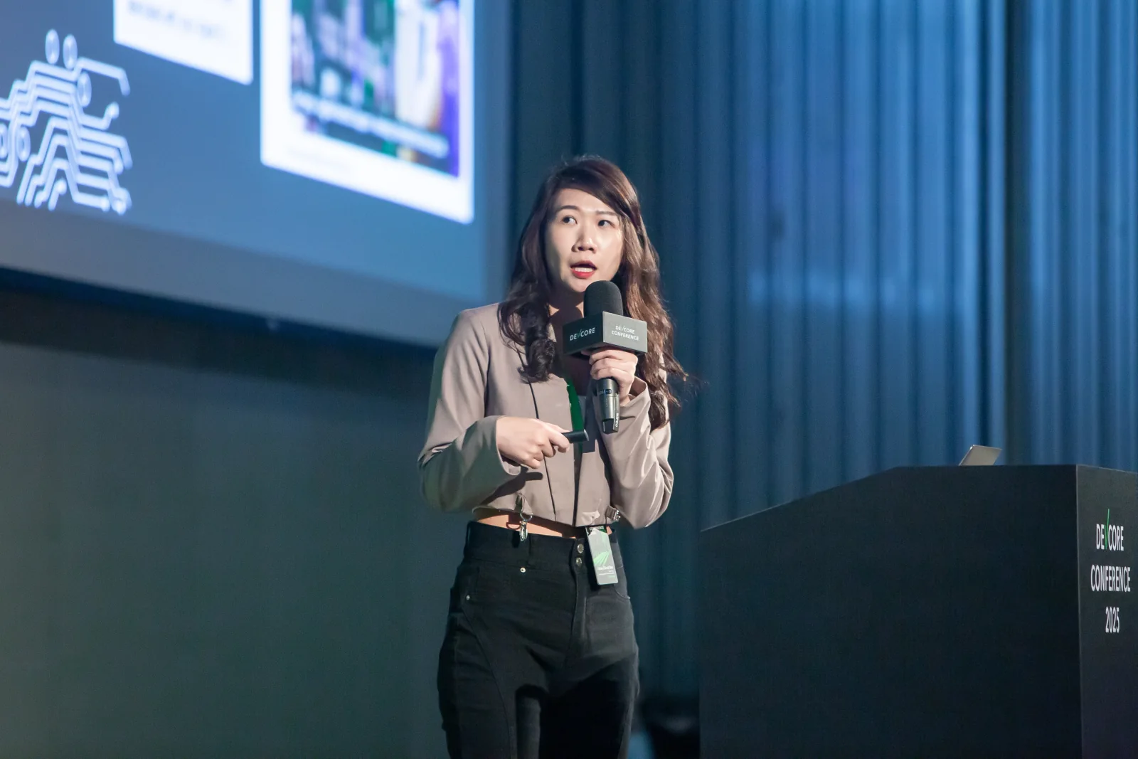 Closer view of Ashley Shen speaking at DEVCORE Conference 2025